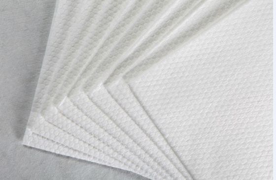 weißes Polyester-62g und dickflüssigesspunlace nichtgewebtes Gewebe-kleines Perlen-Korn-Baumwollgewebe, Auflagen, Feuchtpflegetücher